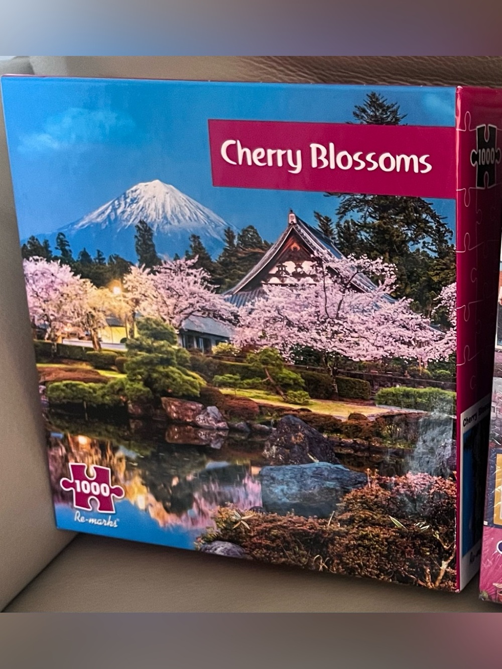 Cherry Blossoms 1000 piece puzzle by Re-marks - NEW - sells online for $20